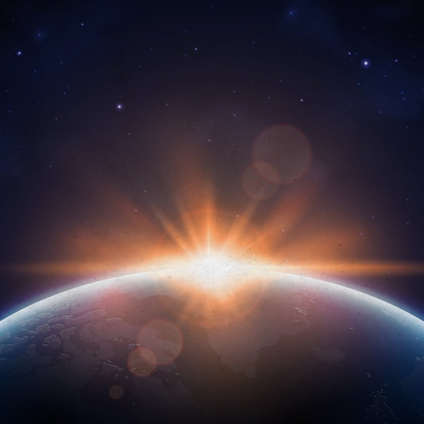 Sol surgindo atrás da curva de um planeta, com estrelas no céu escuro.