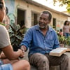 Oração por olhar compassivo, engajamento comunitário e alegria no servir